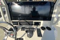 2026 Cobia 285 Center Console dashboard with dual Garmin displays and control panel.
