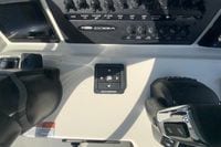 2026 Cobia 285 Center Console dashboard with controls and Seakeeper system.