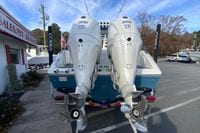 2026 Cobia 285 Center Console with twin 300 V6 engines at a dealership.