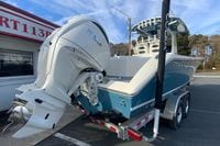 2026 Cobia 285 Center Console boat with Yamaha outboard engine on a trailer.