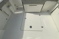 2026 Pursuit DC 266 Dual Console boat interior with storage compartment.