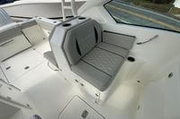 2026 Pursuit DC 266 Dual Console boat interior with gray cushioned seating.
