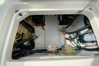 2026 Pursuit DC 266 Dual Console boat engine compartment with wiring and components.