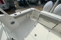 2026 Pursuit DC 266 Dual Console boat interior with seating and storage compartments.