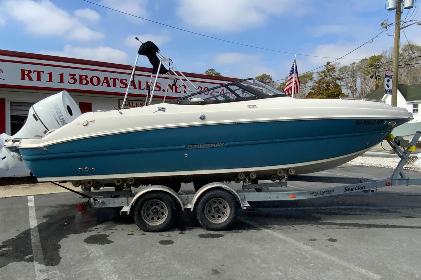 2023 Stingray 231 DC boat on trailer at RT113 Boat Sales.