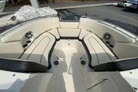 2023 Stingray 231 DC boat interior with spacious seating and cup holders.
