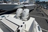 2026 Pursuit S 358 Sport boat with twin Yamaha engines docked at a marina.
