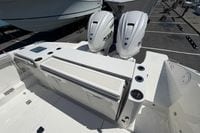 2026 Pursuit S 358 Sport boat with dual outboard engines, sleek deck design.