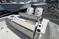 2026 Pursuit S 358 Sport boat with dual Yamaha engines at a marina.