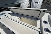 Open storage compartment on 2026 Pursuit S 358 Sport boat with twin Yamaha engines.