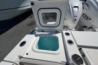 2026 Pursuit S 358 Sport boat with open storage compartment and powerful V8 engines.