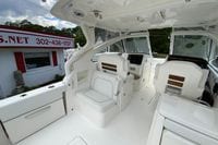 Interior of 2026 Pursuit DC 286 Dual Console boat, featuring sleek white seating and modern design.