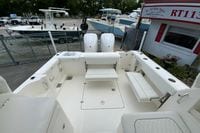 2026 Pursuit DC 286 Dual Console boat interior with seating and storage compartments.