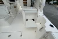 2026 Pursuit DC 286 Dual Console boat interior with seating and storage features.
