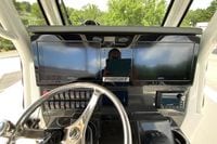 Helm of 2027 Pursuit S 268 Sport boat with dual Garmin displays.