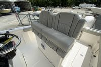 2027 Pursuit S 268 Sport boat interior with gray cushioned seating.