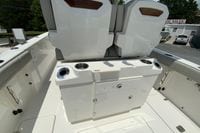 2027 Pursuit S 268 Sport boat interior with seating and storage compartments.