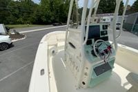 2023 Pathfinder 2400 TRS boat interior with steering console and navigation equipment.