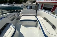 2019 Crownline Eclipse E235 XS boat interior with white and blue seating.