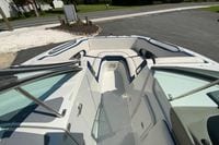 2019 Crownline Eclipse E235 XS boat interior with white seating and blue accents.