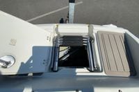 2019 Crownline Eclipse E235 XS boat ladder and storage compartment.