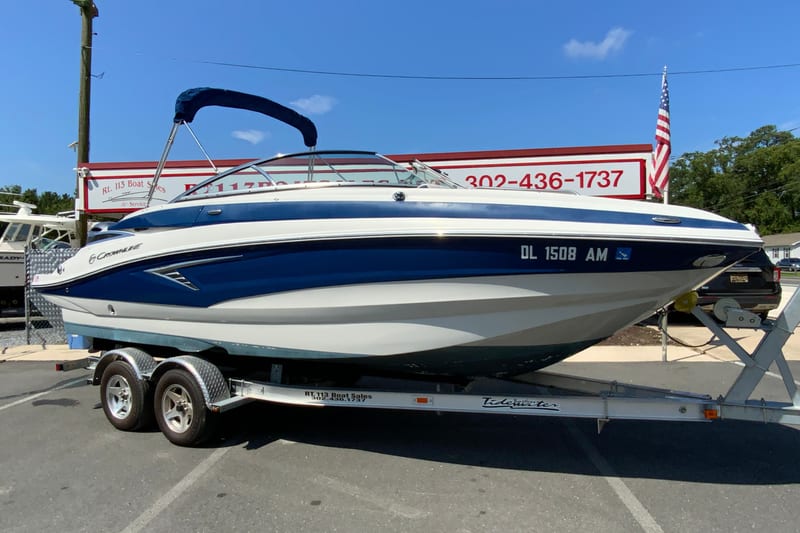 2019 Crownline Eclipse E235 XS boat on trailer at dealership.
