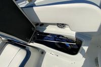 2019 Crownline Eclipse E235 XS boat storage compartment with open lid and visible interior.