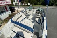 2019 Crownline Eclipse E235 XS boat interior with blue and white seating.