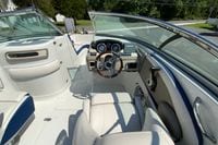 2019 Crownline Eclipse E235 XS boat interior with steering wheel and dashboard controls.