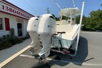 2018 Cobia 301 Center Console boat with twin Yamaha engines at dealership.