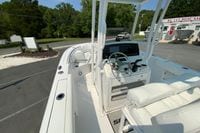 2023 Sportsman Open 232 Center Console boat with modern helm and seating.