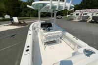2023 Sportsman Open 232 Center Console boat at dealership, showcasing spacious interior and modern design.