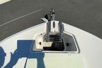 Bow view of 2010 Hurricane SunDeck Sport 200 OB boat with ladder.