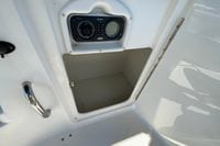 2010 Hurricane SunDeck Sport 200 OB boat storage compartment with Sony stereo system.