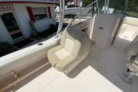 2011 Grady-White Freedom 255 boat interior with seating and helm area.