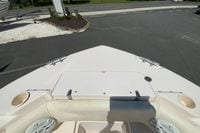 Bow view of 2011 Grady-White Freedom 255 boat, showcasing seating and storage area.