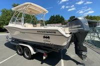 2011 Grady-White Freedom 255 boat on trailer with Yamaha engine, sunny day.