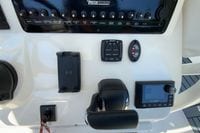 Control panel of 2025 Pathfinder 2600 TRS boat with switches and audio system.