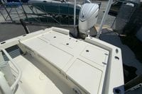 2025 Pathfinder 2600 TRS boat deck with storage compartments and outboard motor.