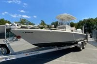 2025 Pathfinder 2600 TRS boat on trailer under clear blue sky.