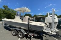 2025 Pathfinder 2600 TRS boat on trailer, parked outdoors under clear blue sky.