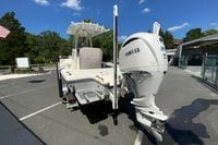 2025 Pathfinder 2600 TRS boat with Yamaha V6 engine, parked outdoors under blue sky.