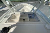 2014 Sailfish 290 CC boat deck with storage compartments and Garmin equipment.