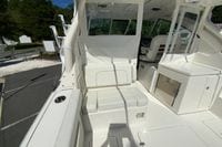 Interior view of 2027 Pursuit D 326 Denali boat, featuring seating and storage.