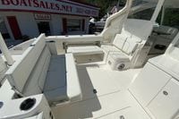 Luxurious 2027 Pursuit D 326 Denali boat interior with white seating and modern design.