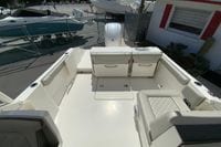 2024 Pursuit DC 246 Dual Console boat interior with spacious seating and storage.