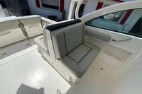 2024 Pursuit DC 246 Dual Console boat interior with cushioned seating and sleek design.