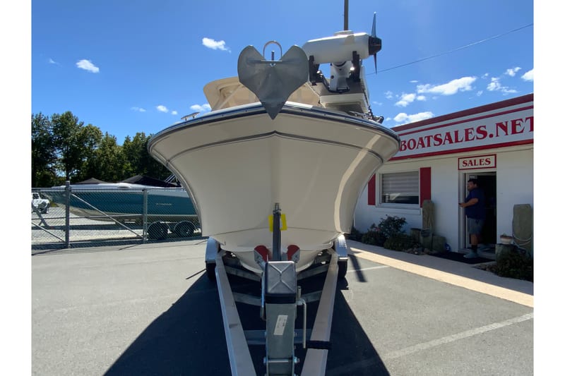 2017 Grady-White Freedom 255 boat on trailer at dealership under clear blue sky.