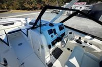 2027 Cobia 250 Dual Console boat interior with modern dashboard and seating.