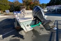 2007 Clearwater 1900 Baystar boat with Yamaha outboard motor in a parking lot.
